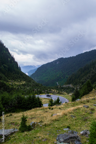 Driving on a road through the mountains