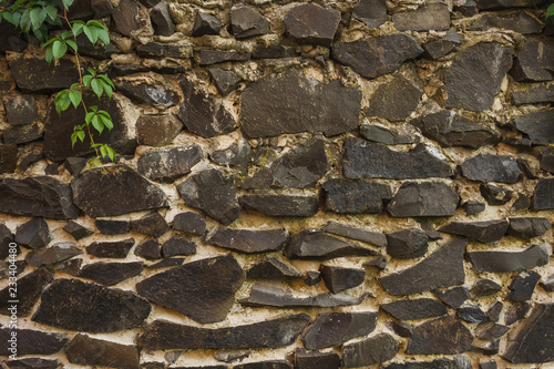 A stone masonry for a texture or a background. A fragment of the wall