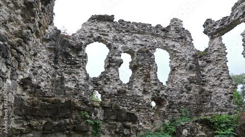 Panoramic view of ruins of Medieval Castle in Seredne village, Transcarpathia, Ukraine. Built in XII century, one of the oldest medieval castles, preserving its old character in its ruinous condition photo