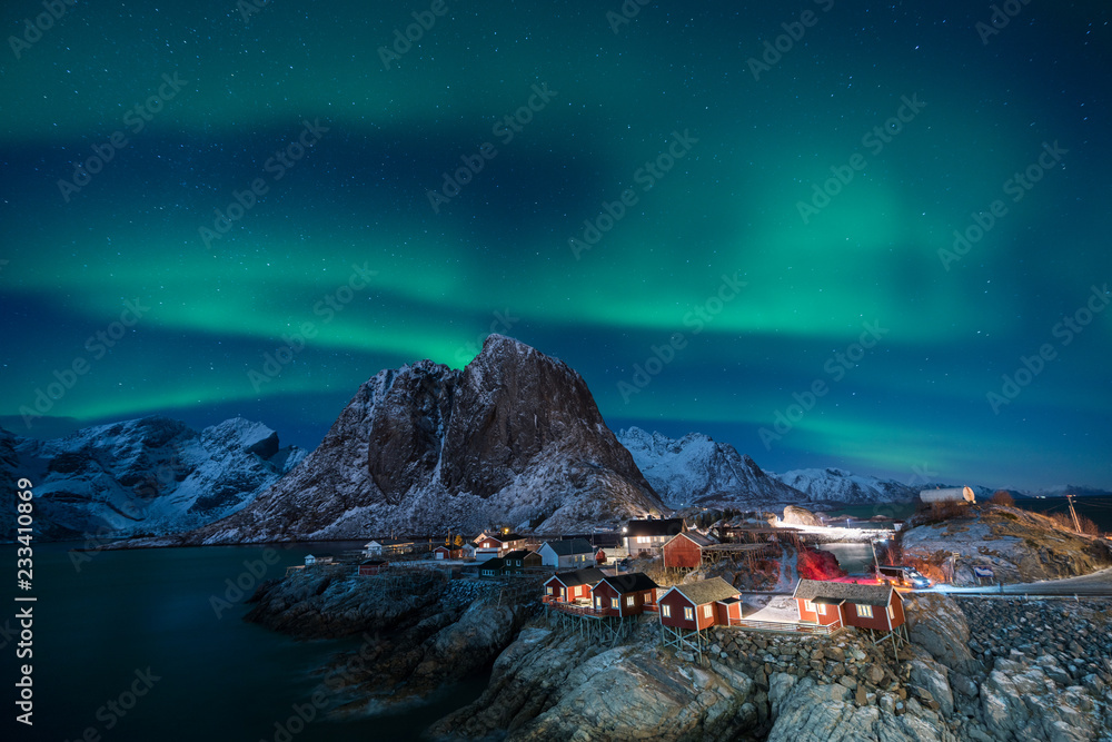 Fisherman village with Aurora in the background travel concept world explore northern light / Lofoten Norway - obrazy, fototapety, plakaty 