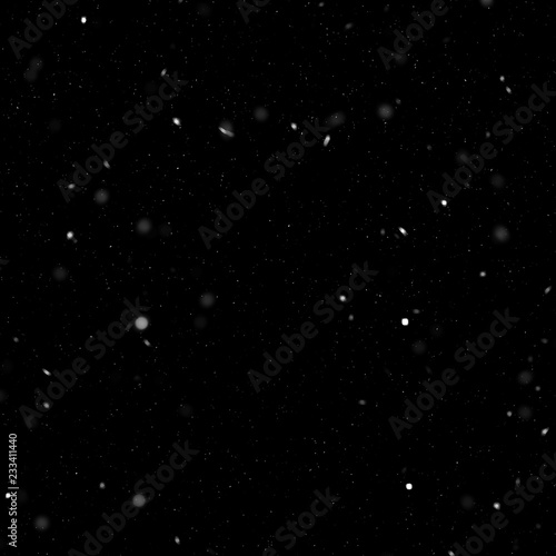 Isolated natural white snow texture effect on black night background. Winter snowflakes.