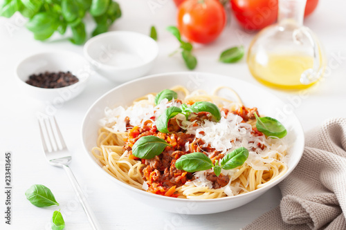 spaghetti bolognese with basil and parmesan, italian pasta