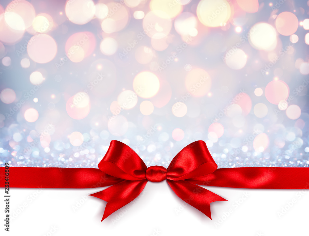 Red Ribbon With Bow On Shiny Silver Background - Christmas Gift
Red Ribbon With Bow On Shiny Silver Background - Christmas Gift