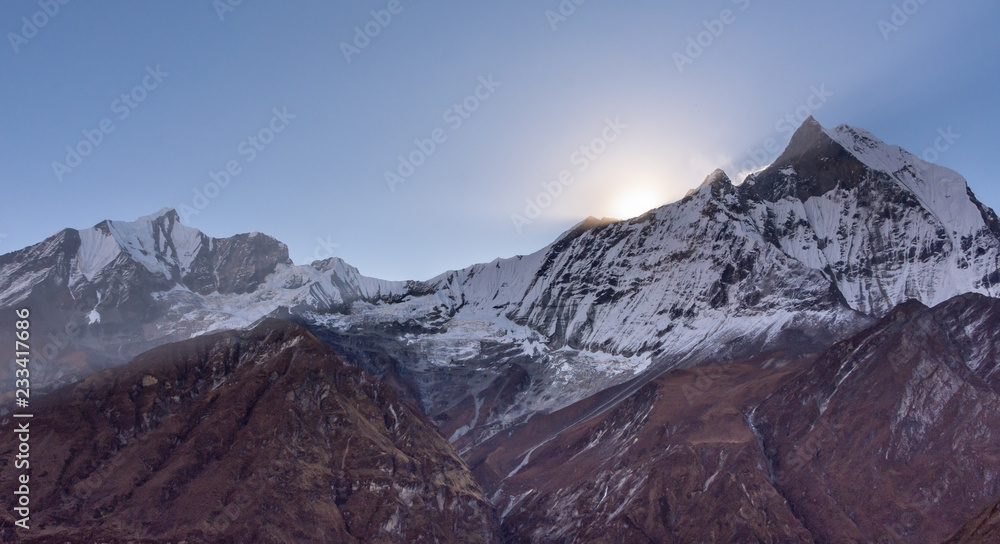 Fototapeta Sunshine from summit of Fish Tail Peak ( also Machapuchare), Himalayas