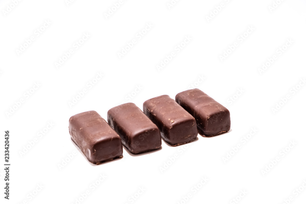 Chocolate candies on white background close up Chocolate candies on white background close up