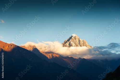 View of Himalaya mountains at sunrise near Lukla, Nepal. Everest Base Camp trek, Sagarmatha national park