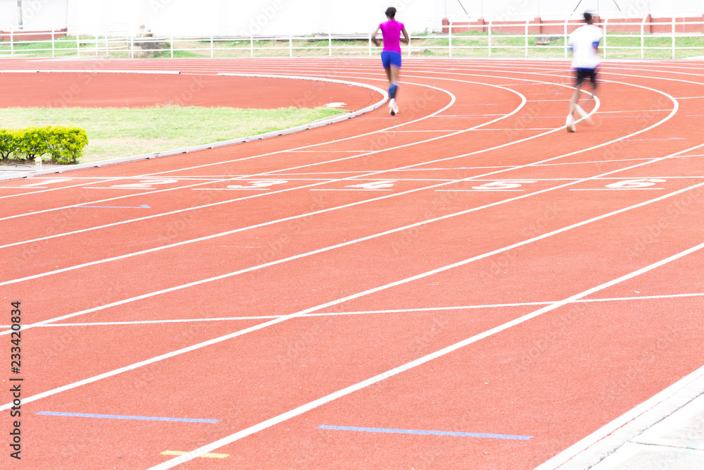 Athletics people running on the track field