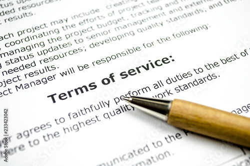 Terms of service with wooden pen