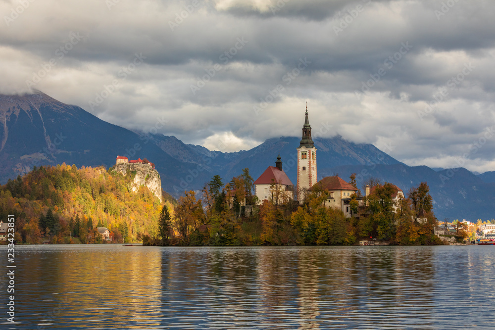 Lake Bled is a lake in the Julian Alps of the Upper Carniolan region of northwestern Slovenia, where it adjoins the town of Bled. The area is a tourist destination.