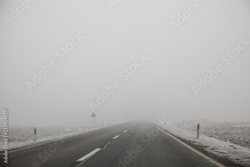 Empty road in cold winter © marjan4782