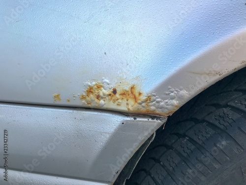 Rust on a silver car 