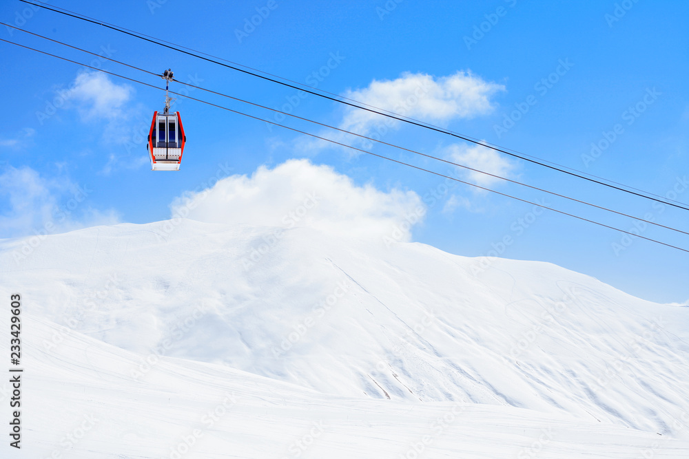 Gondola lift and snowy mountains. Ski resort Gudauri, Georgia. Caucasus Mountains. Gondola lift and snowy mountains. Ski resort Gudauri, Georgia. Caucasus Mountains.
