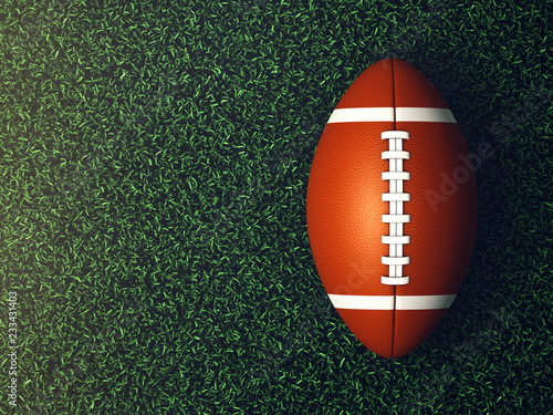 American football ball on grass lit by spotlight seen from the top, Game night background
