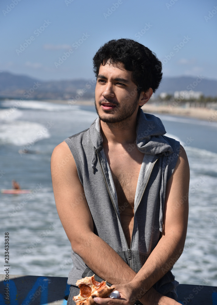 Carefree young man at the beach