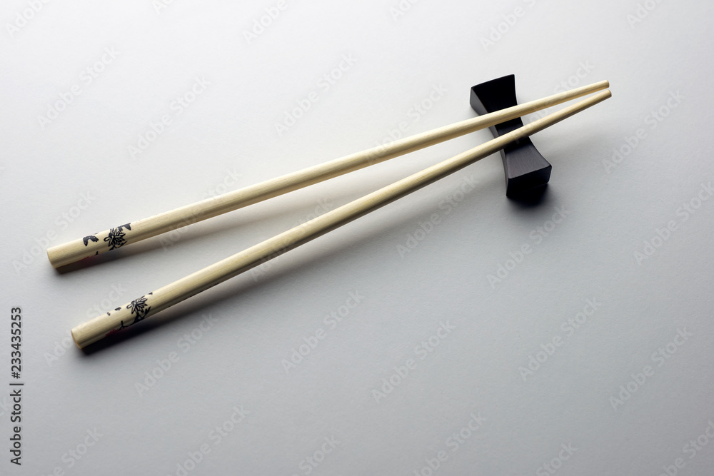 Rice chopsticks decorated on a white background Rice chopsticks decorated on a white background