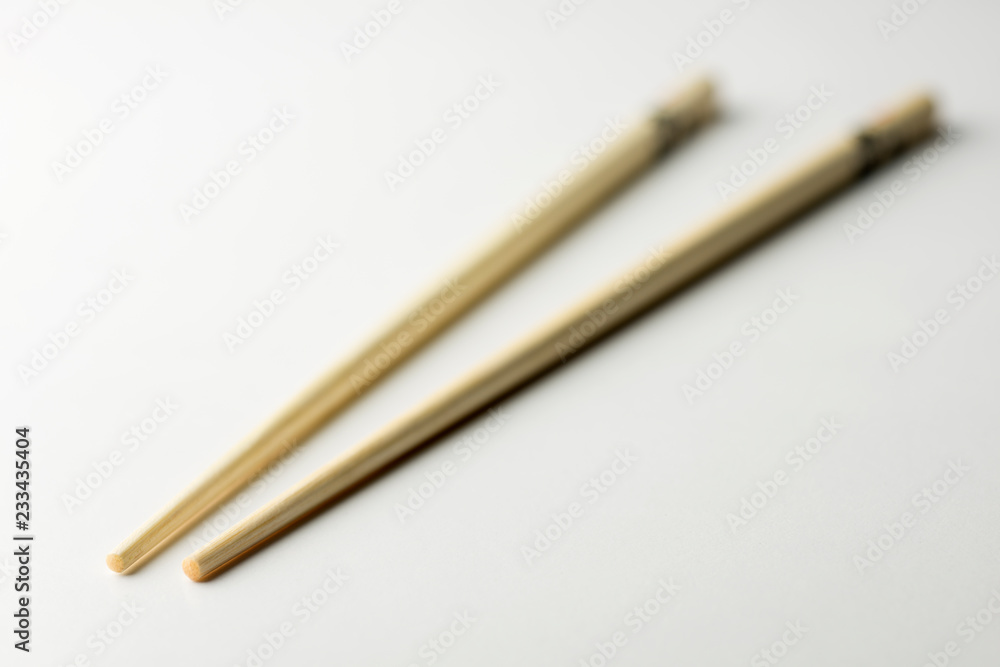 Rice chopsticks decorated on a white background