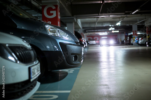 Underground parking / garage with huge arrange of cars © Khaligo