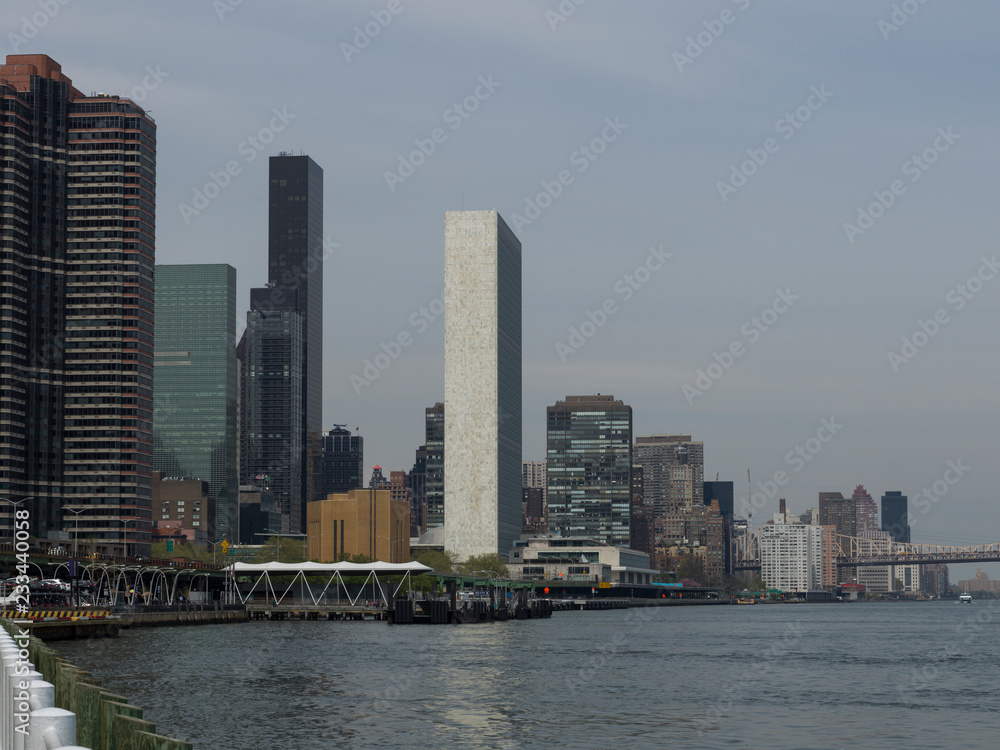 Naklejka premium Buildings on the waterfront, East River, New York City, New York State, USA