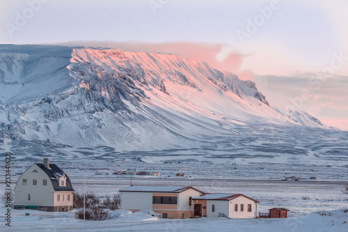 Snow covered U shaped glacial valley, Skutusadir, Lake Myvatn, Iceland in late evening light