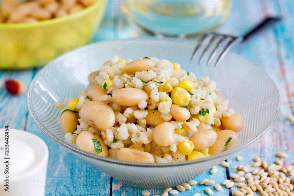 Pearl barley, white bean and corn vegetarian salad in bowl Pearl barley, white bean and corn vegetarian salad in bowl