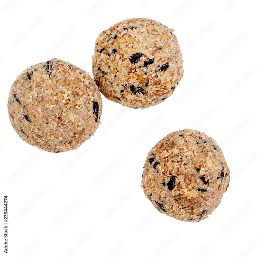 Fototapeta premium Fat balls for feeding wild garden birds, suet, no nets, isolated on white background.