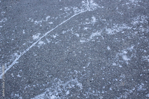 Asphalt with first snow - I...