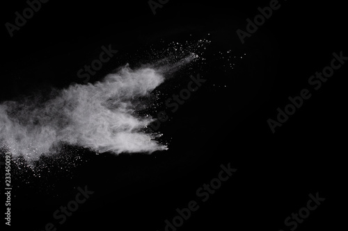 Fototapeta Naklejka Na Ścianę i Meble -  White powder isolated on black background.