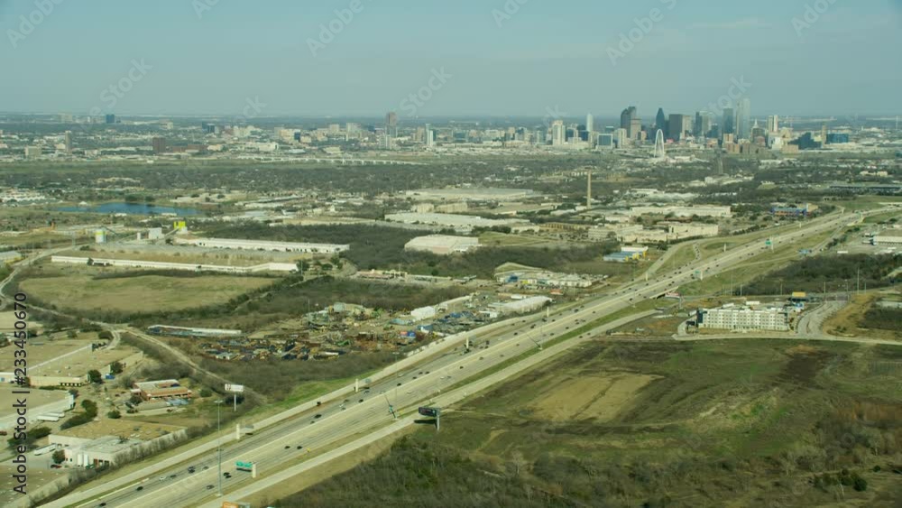Aerial of city freeway commercial suburbs skyscrapers Dallas Aerial of city freeway commercial suburbs skyscrapers Dallas