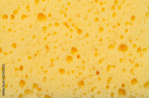 Clean sponge yellow macro texture porous background