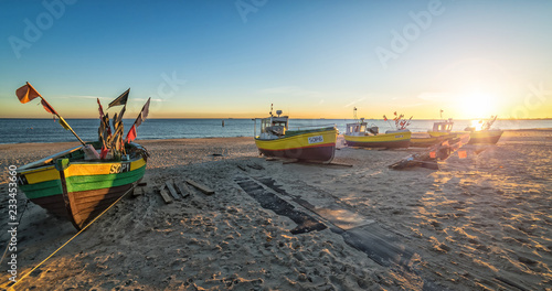 Autumn panorama landscape with fishermans boats by the sea