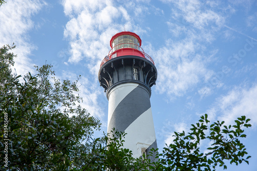 lighthouse on background of blue sky