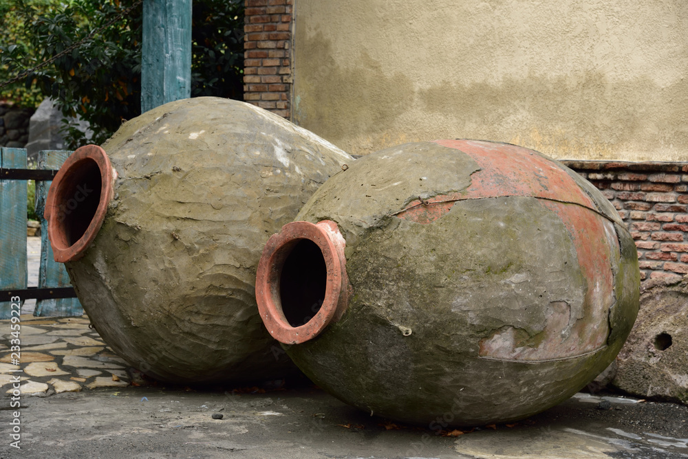 Old clay pitchers for wine production. Old clay pitchers for wine production.