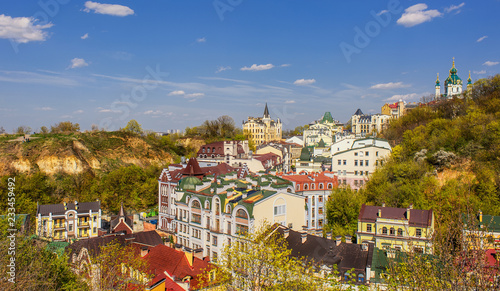 Kiev city old houses on the vozdvizhenska street and st andrew s church against the blue sky photo