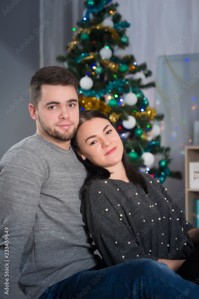 Fototapeta premium Happy couple on romantic evening before Christmas