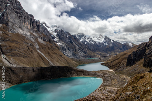 The three lakes / tres lagunas in the Cordillera Huayhuash, Andes Mountains, Peru photo