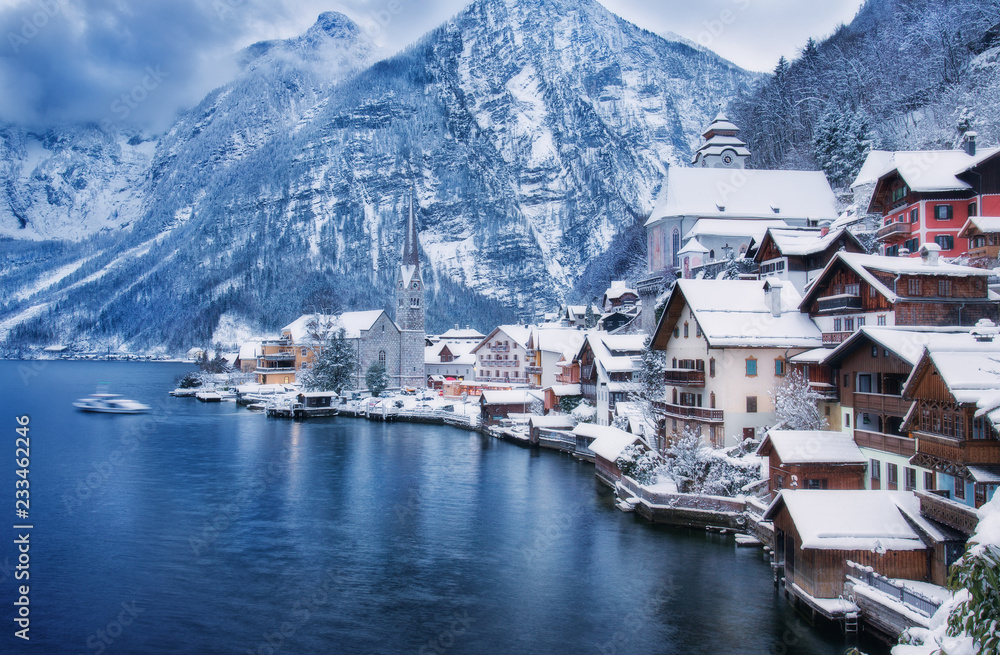 Classic postcard view of famous Hallstatt lakeside town in the Alps. Traditional austrian wood village, UNESCO world culture heritage site, Austria. Christmas card.