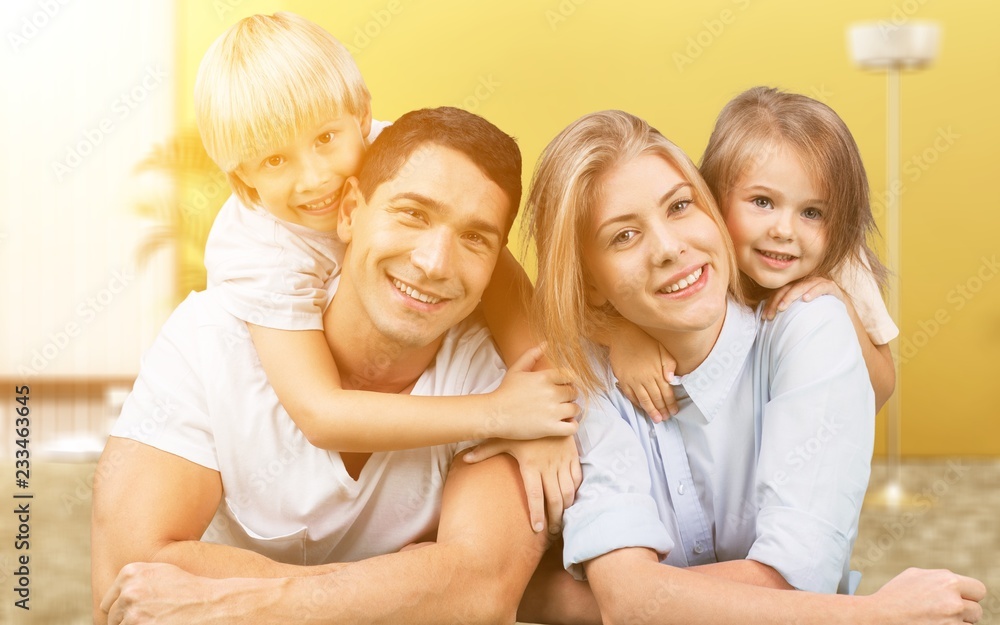 Beautiful smiling Lovely family on background Beautiful smiling Lovely family on background