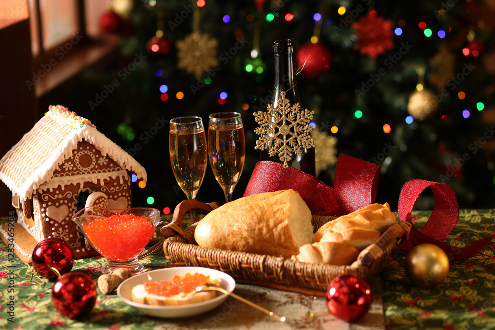 bread with caviar, champagne and Christmas tree