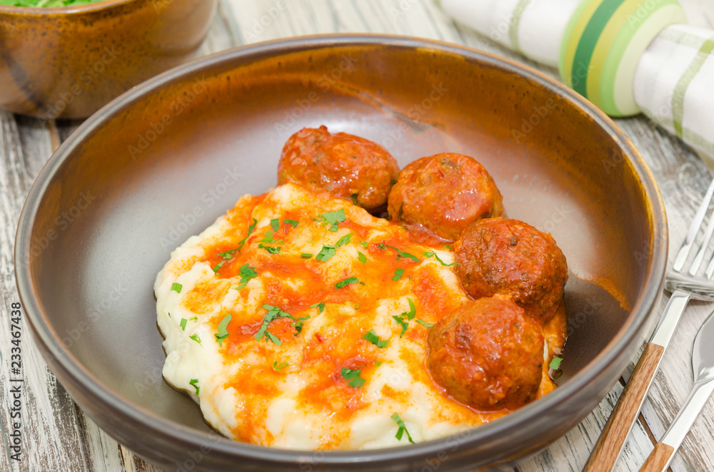 Fried meatballs with mashed potatoes and sauce. Fried turkey meatballs with puree