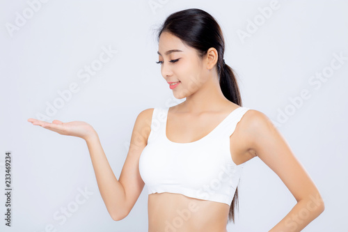 Portrait asian woman smiling beautiful body diet with fit presenting something empty copy space on the hand isolated on white background, model girl weight slim with calories, health concept.