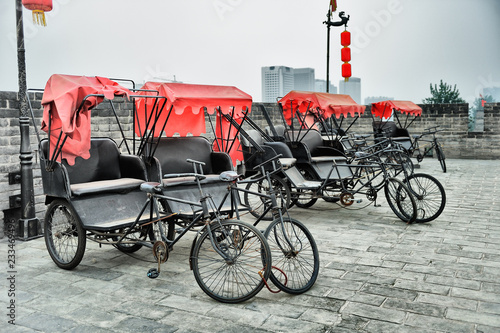 Rent rickshaws tricycles on city wall in Xi'an, China