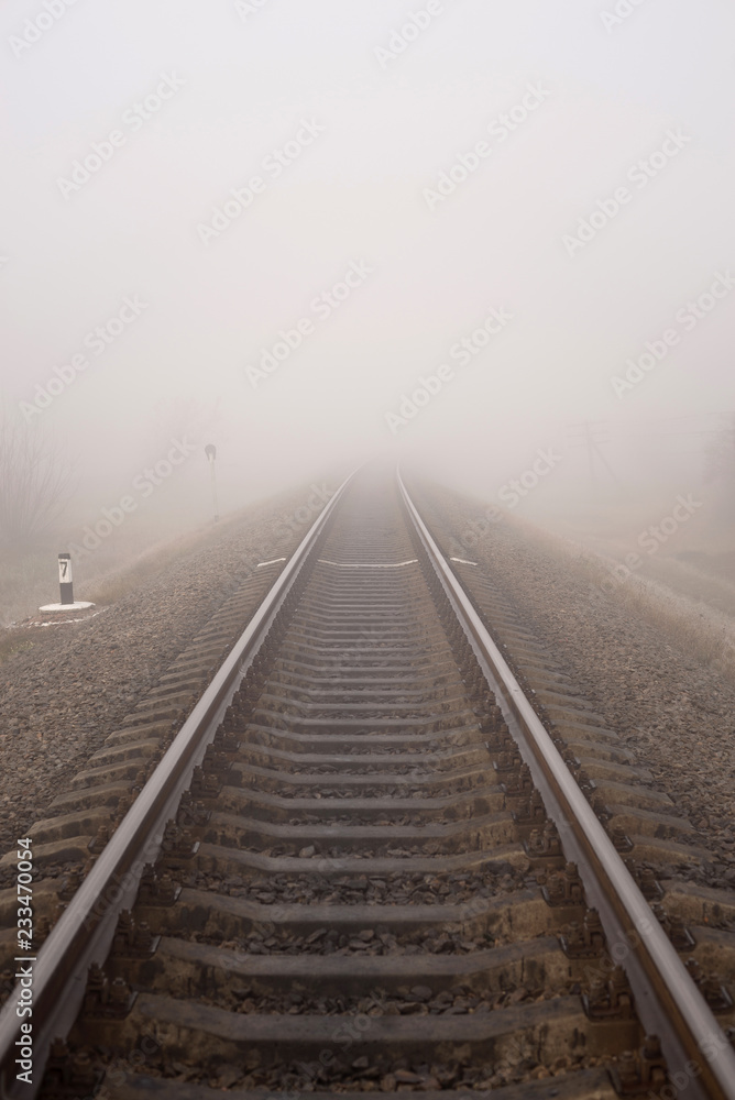 Foggy railway landscape. Vertical photo. Foggy railway landscape. Vertical photo.