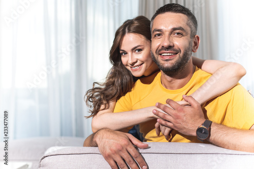 Принти на полотні Lovely married couple in best mood is cute smiling on camera