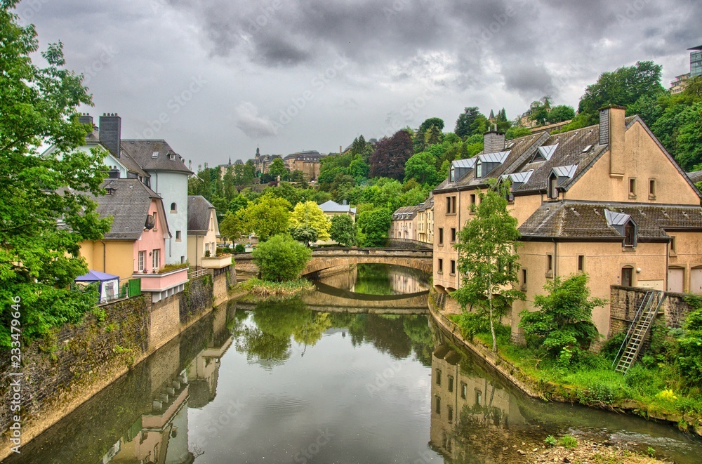 River with houses and bridges in Luxembourg, Benelux, HDR