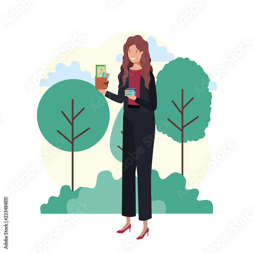 woman with wallet and credit card in landscape