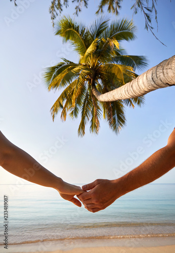 Couple on the tropical beach photo