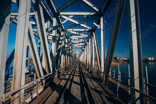 Railway track on steel railway bridge over Voronezh river