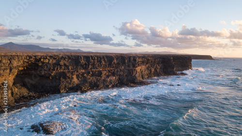 aerial view west coast of Fuerteventura at sunset