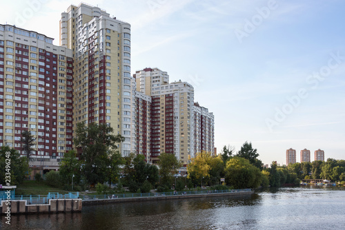 Russia  Moscow August 2018  Building of a modern residential complex on the river bank. View from the boat.