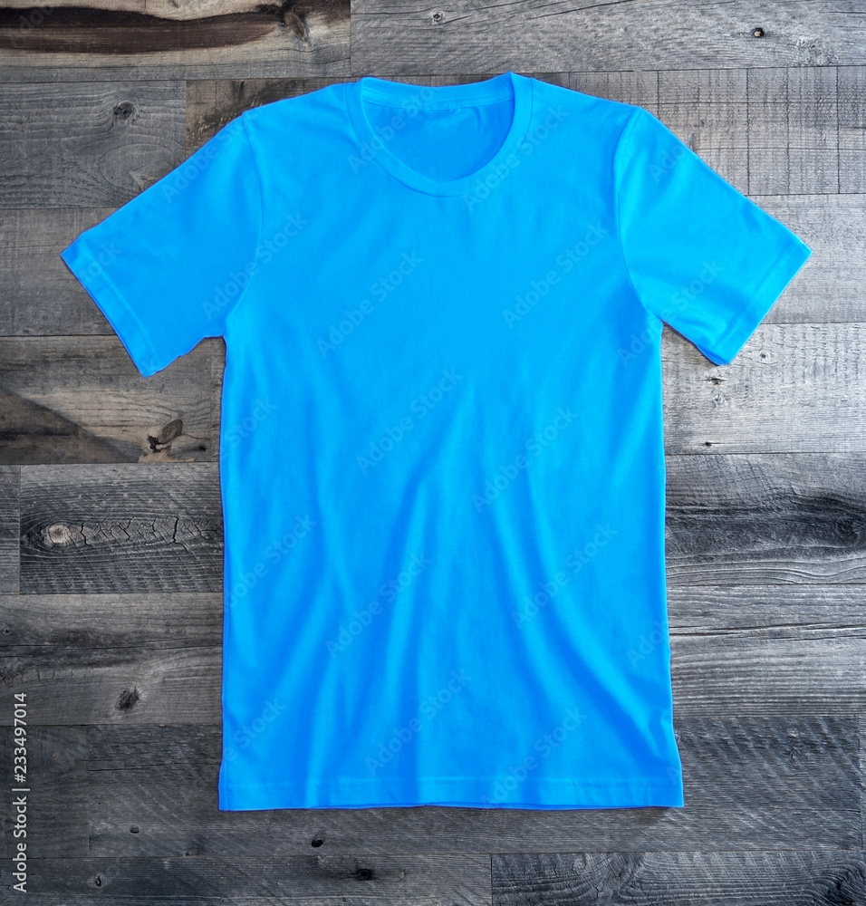 Bright Blue Blank Tee Shirt Stock Photo | Adobe Stock